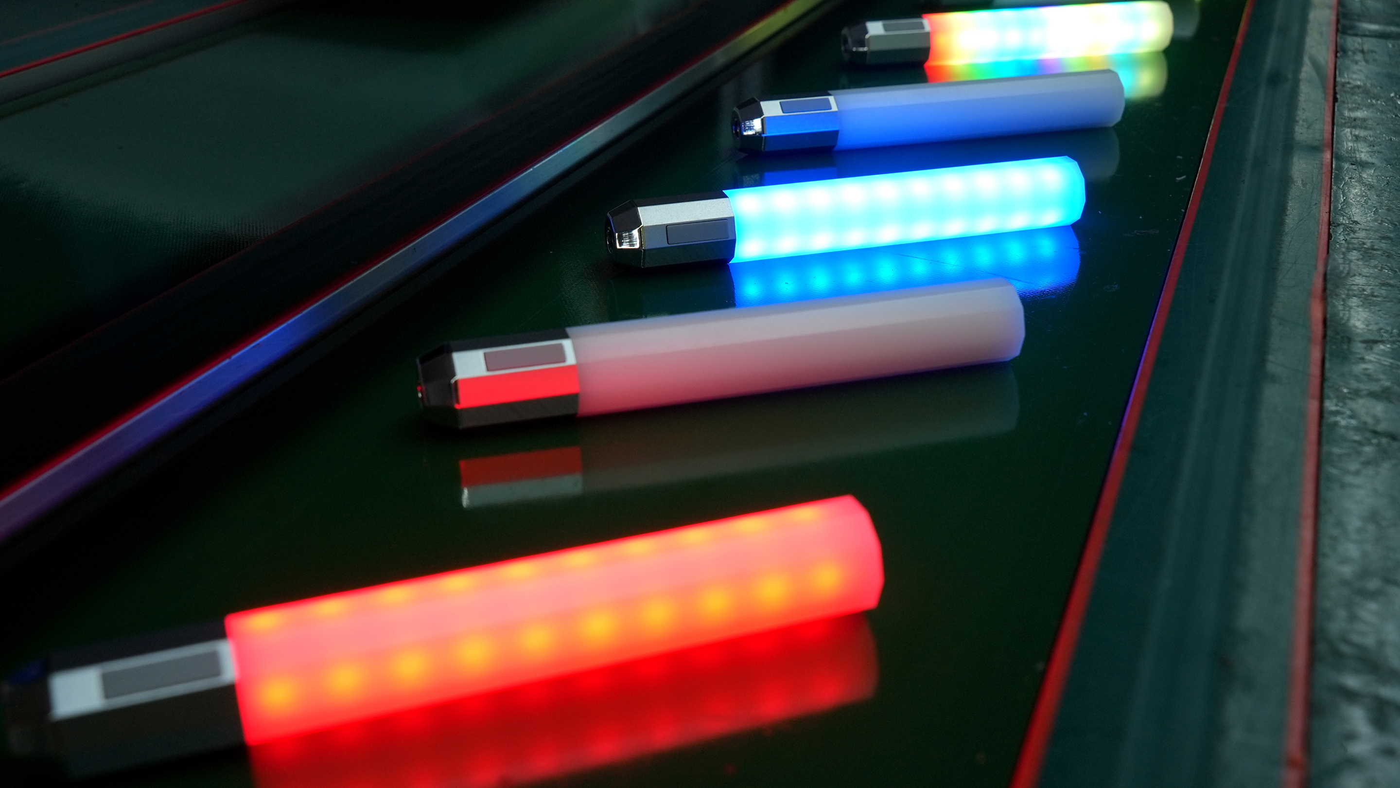 Litsaber devices glowing on a surface