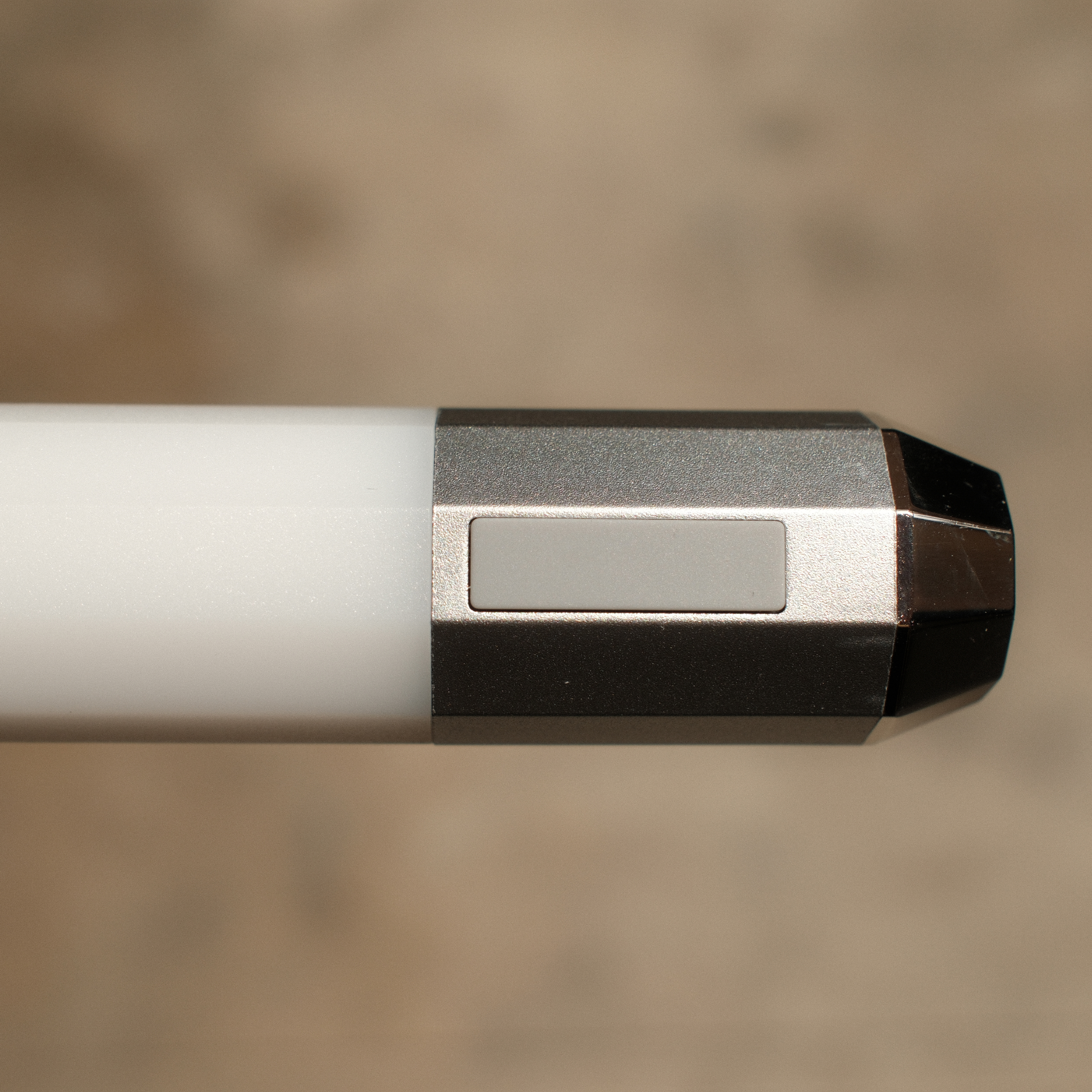 Litsaber button side view