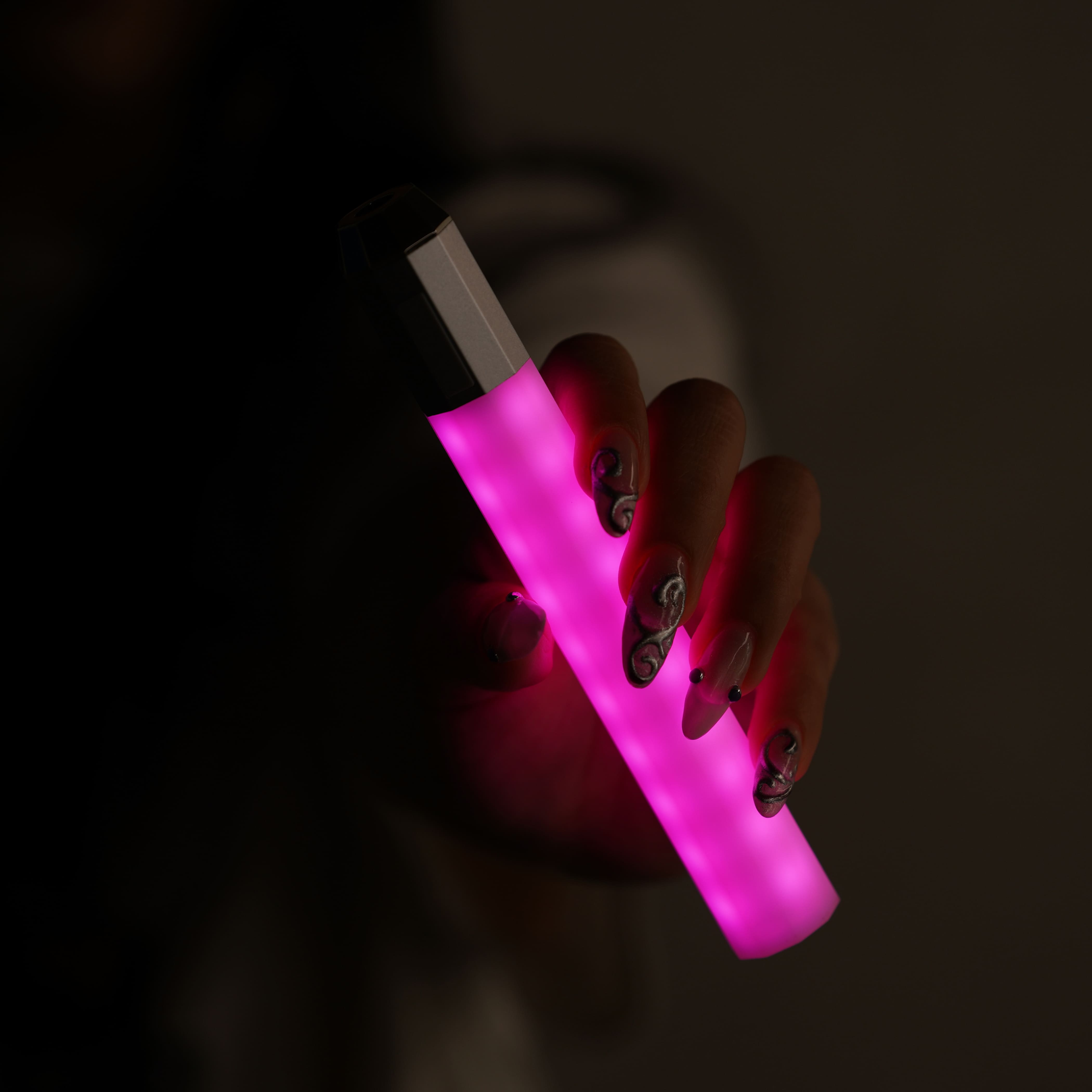 Litsaber in fuchsia handheld