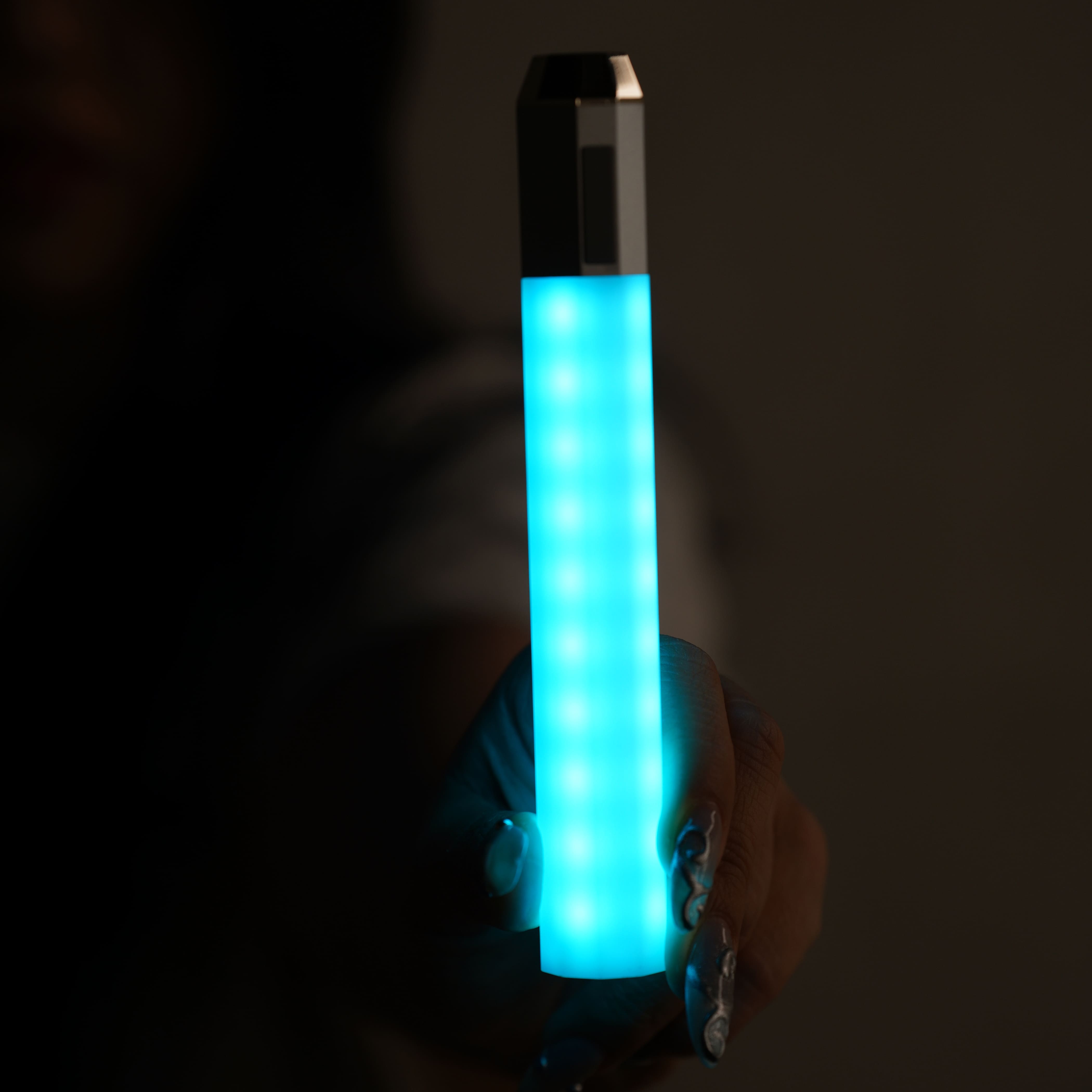 Litsaber in turquoise handheld
